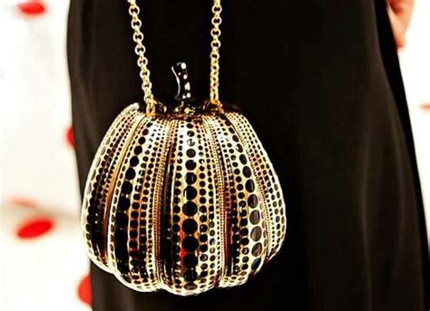 kusama pumpkin minaudiere jewel bag.